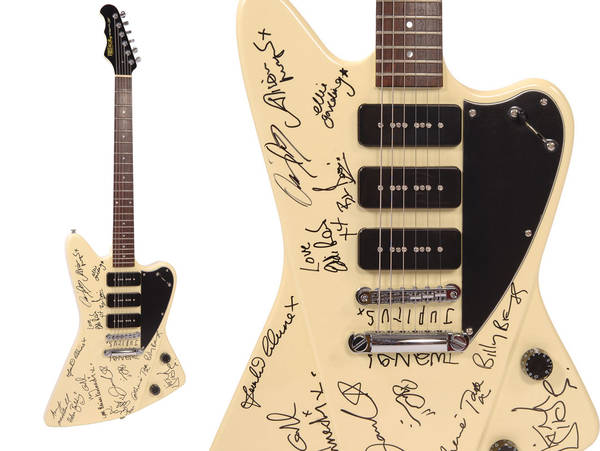 Kirsty MacColl signed Fret-King guitar auction to raise money for Cuban children